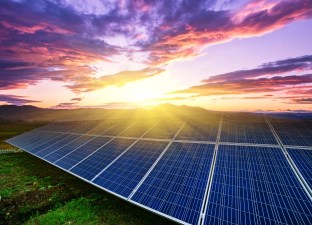 solar panels  under blue sky on sunset