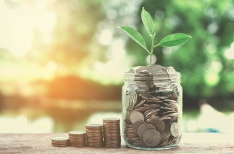 business concept money of glass and growht small tree