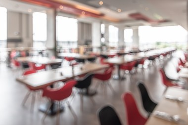 Canteen, cafeteria, hotel restaurant blur background with blurry dining table and chair in school or university food facility interior empty hall